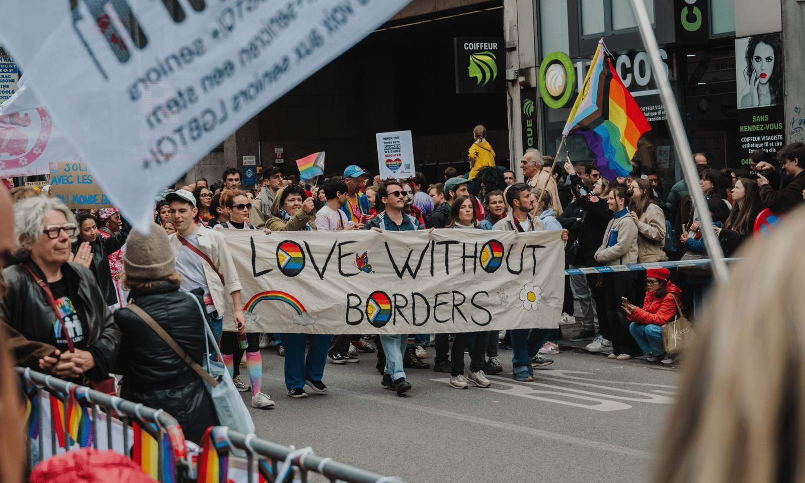 Pride parade with banner "love without borders"
