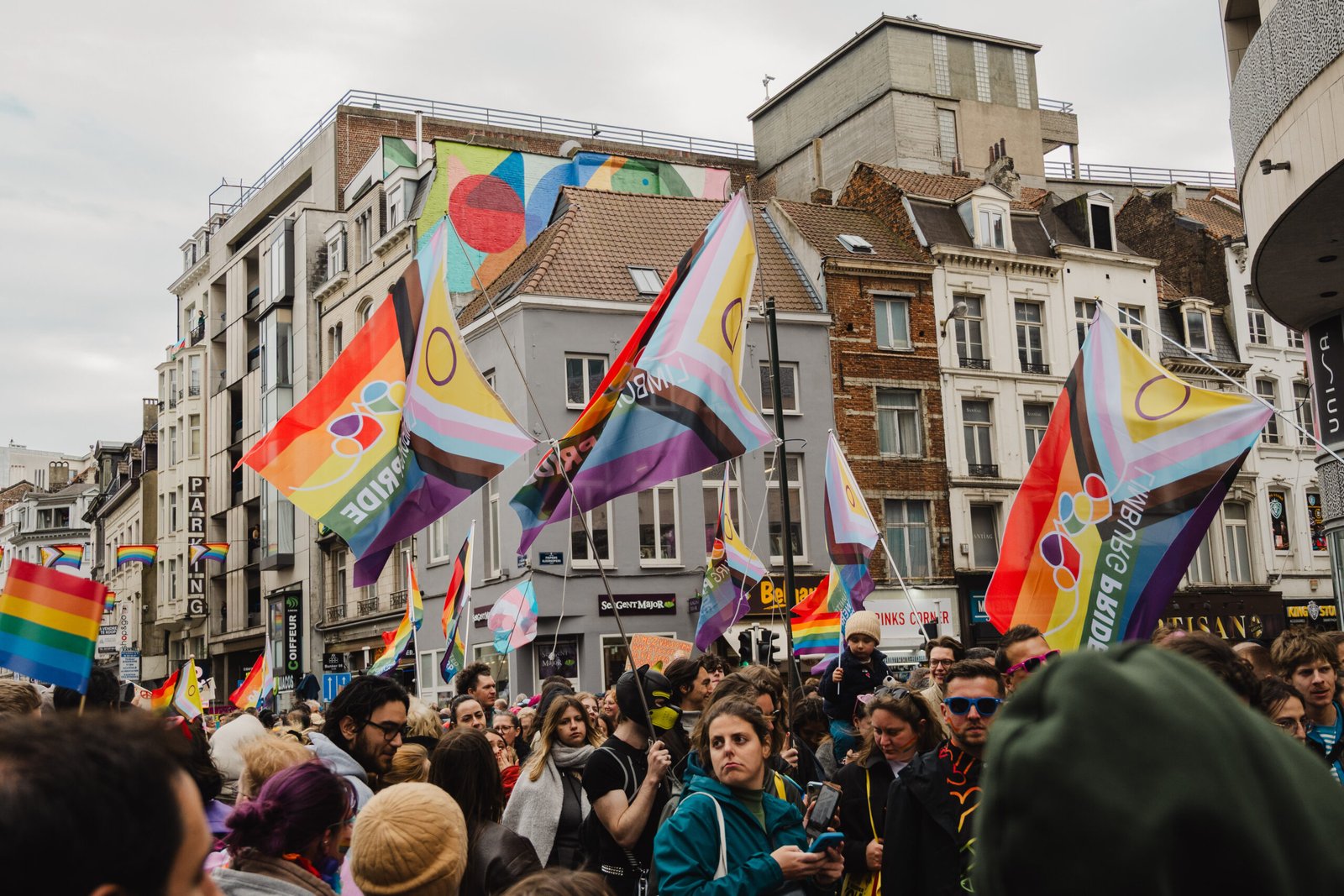 Crowd celebrating Pride with flags