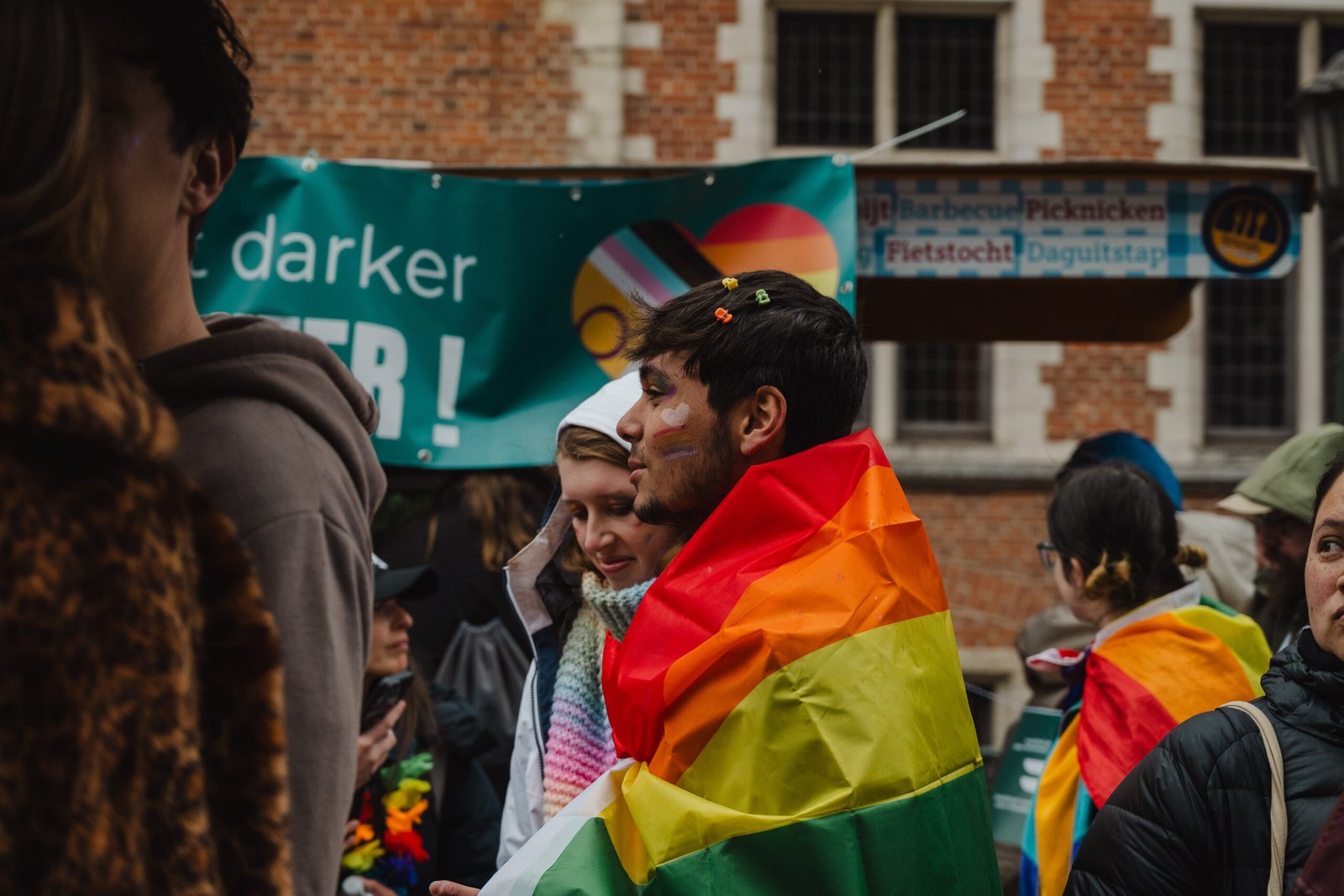 Pride celebration with colorful flags.